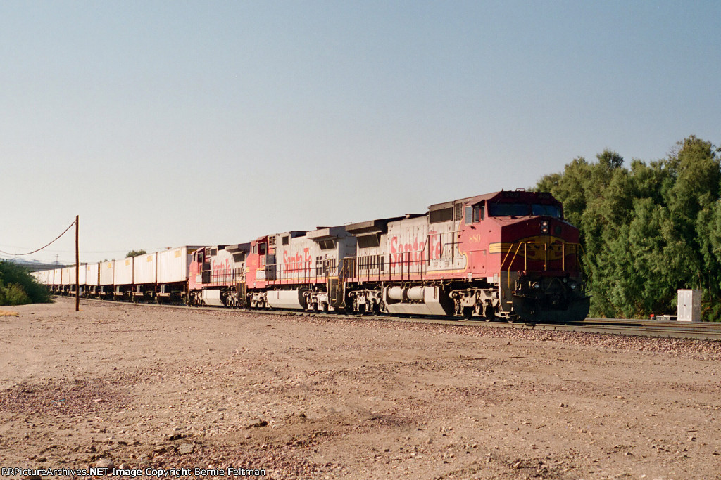 Santa Fe C40-8W #880 leads a J. B. Hunt intermodal train eastbound 